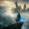 Hogwarts Legacy statistics: Wizard holding his wand and looking at the castle